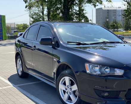 Чорний Міцубісі Lancer, об'ємом двигуна 2 л та пробігом 170 тис. км за 7000 $, фото 13 на Automoto.ua