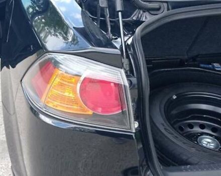 Чорний Міцубісі Lancer, об'ємом двигуна 2 л та пробігом 49 тис. км за 12500 $, фото 1 на Automoto.ua