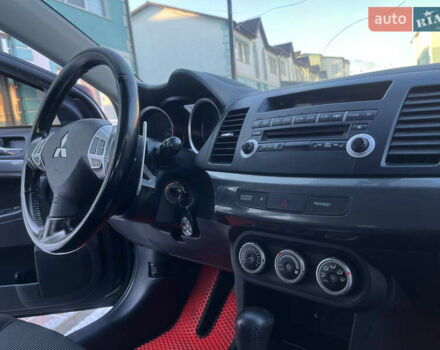 Чорний Міцубісі Lancer, об'ємом двигуна 1.8 л та пробігом 138 тис. км за 6777 $, фото 35 на Automoto.ua