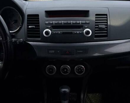 Чорний Міцубісі Lancer, об'ємом двигуна 1.8 л та пробігом 330 тис. км за 7000 $, фото 3 на Automoto.ua