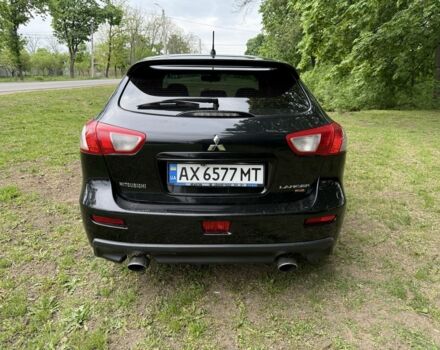 Черный Мицубиси Лансер, объемом двигателя 2 л и пробегом 190 тыс. км за 7100 $, фото 3 на Automoto.ua