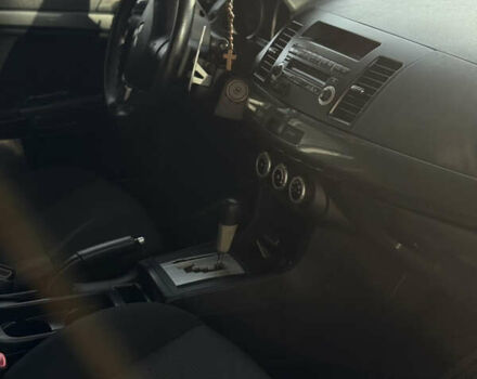 Мицубиси Лансер 2008 в Днепре (Днепропетровске) на Automoto.ua Черный Мицубиси Лансер, объемом двигателя 1.8 л и пробегом 280 тыс. км за 6299 $, фото 7 на Automoto.ua