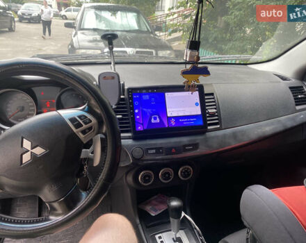 Черный Мицубиси Лансер, объемом двигателя 1.8 л и пробегом 218 тыс. км за 6800 $, фото 9 на Automoto.ua