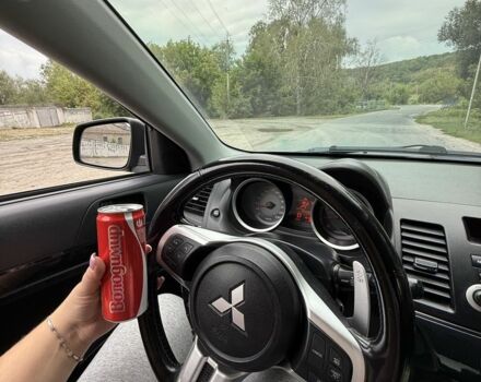 Черный Мицубиси Лансер, объемом двигателя 2 л и пробегом 190 тыс. км за 7100 $, фото 6 на Automoto.ua