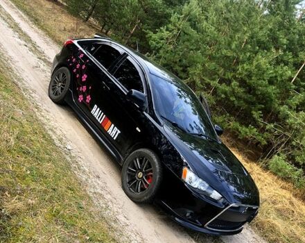 Черный Мицубиси Лансер, объемом двигателя 20 л и пробегом 160 тыс. км за 10200 $, фото 1 на Automoto.ua