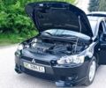 Чорний Міцубісі Lancer, об'ємом двигуна 2 л та пробігом 49 тис. км за 12500 $, фото 9 на Automoto.ua