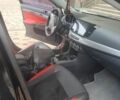 Черный Мицубиси Лансер, объемом двигателя 2 л и пробегом 130 тыс. км за 7700 $, фото 2 на Automoto.ua
