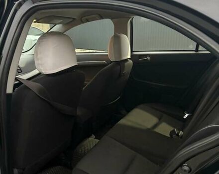 Чорний Міцубісі Lancer, об'ємом двигуна 1.8 л та пробігом 330 тис. км за 7000 $, фото 11 на Automoto.ua