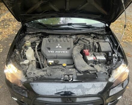 Черный Мицубиси Лансер, объемом двигателя 2 л и пробегом 190 тыс. км за 7100 $, фото 7 на Automoto.ua