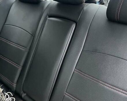 Черный Мицубиси Лансер, объемом двигателя 2 л и пробегом 260 тыс. км за 6000 $, фото 10 на Automoto.ua