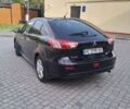 Черный Мицубиси Лансер, объемом двигателя 1.8 л и пробегом 238 тыс. км за 5950 $, фото 1 на Automoto.ua