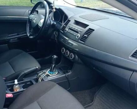 Чорний Міцубісі Lancer, об'ємом двигуна 2 л та пробігом 49 тис. км за 12500 $, фото 27 на Automoto.ua