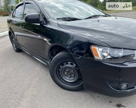 Чорний Міцубісі Lancer, об'ємом двигуна 1.8 л та пробігом 193 тис. км за 7500 $, фото 3 на Automoto.ua