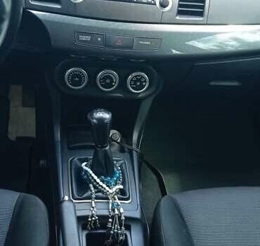 Чорний Міцубісі Lancer, об'ємом двигуна 2 л та пробігом 49 тис. км за 12500 $, фото 33 на Automoto.ua