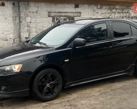 Черный Мицубиси Лансер, объемом двигателя 1.8 л и пробегом 218 тыс. км за 6800 $, фото 1 на Automoto.ua