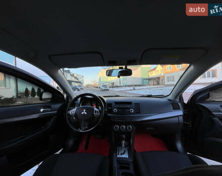 Чорний Міцубісі Lancer, об'ємом двигуна 1.8 л та пробігом 138 тис. км за 6777 $, фото 51 на Automoto.ua