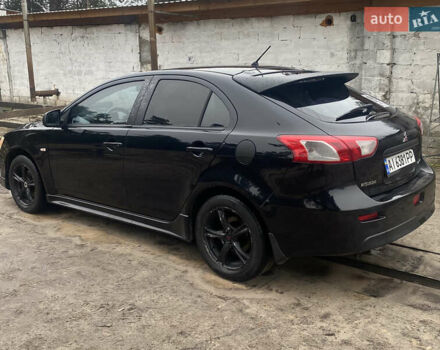 Черный Мицубиси Лансер, объемом двигателя 1.8 л и пробегом 218 тыс. км за 6800 $, фото 2 на Automoto.ua