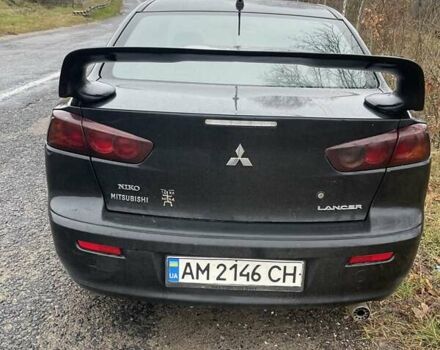 Черный Мицубиси Лансер, объемом двигателя 2 л и пробегом 260 тыс. км за 6000 $, фото 5 на Automoto.ua