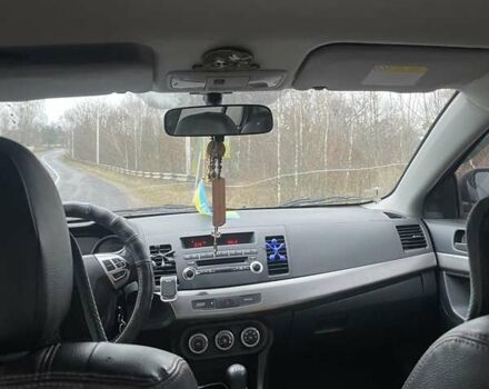 Черный Мицубиси Лансер, объемом двигателя 2 л и пробегом 260 тыс. км за 6000 $, фото 8 на Automoto.ua