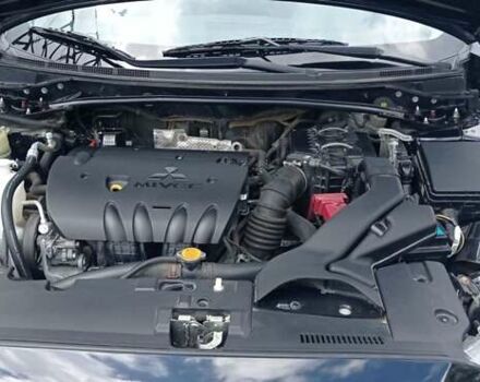Чорний Міцубісі Lancer, об'ємом двигуна 2 л та пробігом 49 тис. км за 12500 $, фото 22 на Automoto.ua