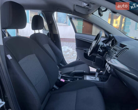 Чорний Міцубісі Lancer, об'ємом двигуна 1.8 л та пробігом 138 тис. км за 6777 $, фото 33 на Automoto.ua