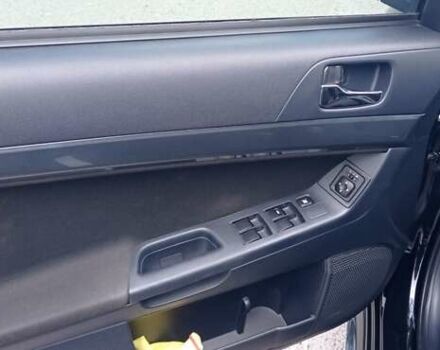 Чорний Міцубісі Lancer, об'ємом двигуна 2 л та пробігом 49 тис. км за 12500 $, фото 29 на Automoto.ua