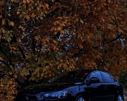 Черный Мицубиси Лансер, объемом двигателя 2 л и пробегом 190 тыс. км за 7100 $, фото 1 на Automoto.ua