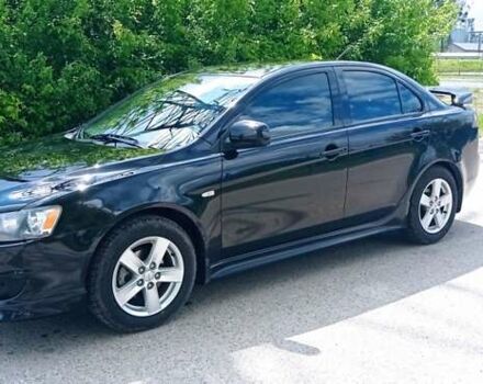 Чорний Міцубісі Lancer, об'ємом двигуна 2 л та пробігом 49 тис. км за 12500 $, фото 43 на Automoto.ua