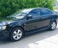 Чорний Міцубісі Lancer, об'ємом двигуна 2 л та пробігом 49 тис. км за 12500 $, фото 43 на Automoto.ua