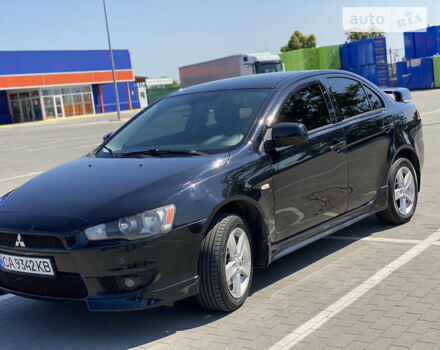 Чорний Міцубісі Lancer, об'ємом двигуна 2 л та пробігом 170 тис. км за 7000 $, фото 1 на Automoto.ua