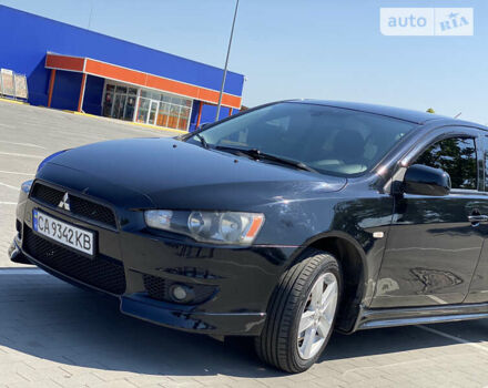 Чорний Міцубісі Lancer, об'ємом двигуна 2 л та пробігом 170 тис. км за 7000 $, фото 2 на Automoto.ua