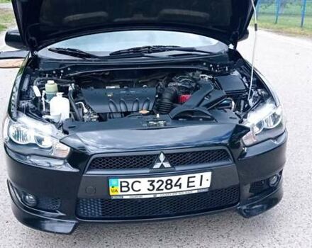 Чорний Міцубісі Lancer, об'ємом двигуна 2 л та пробігом 49 тис. км за 12500 $, фото 21 на Automoto.ua