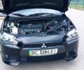 Чорний Міцубісі Lancer, об'ємом двигуна 2 л та пробігом 49 тис. км за 12500 $, фото 21 на Automoto.ua