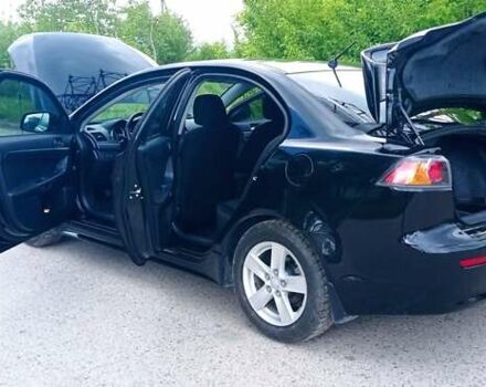 Чорний Міцубісі Lancer, об'ємом двигуна 2 л та пробігом 49 тис. км за 12500 $, фото 10 на Automoto.ua