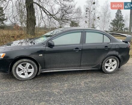 Черный Мицубиси Лансер, объемом двигателя 2 л и пробегом 260 тыс. км за 6000 $, фото 7 на Automoto.ua