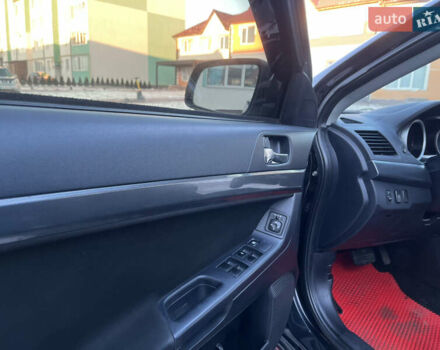 Чорний Міцубісі Lancer, об'ємом двигуна 1.8 л та пробігом 138 тис. км за 6777 $, фото 41 на Automoto.ua