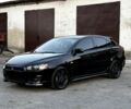 Чорний Міцубісі Lancer, об'ємом двигуна 1.8 л та пробігом 190 тис. км за 7678 $, фото 1 на Automoto.ua