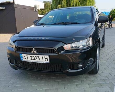 Чорний Міцубісі Lancer, об'ємом двигуна 2 л та пробігом 145 тис. км за 5200 $, фото 2 на Automoto.ua