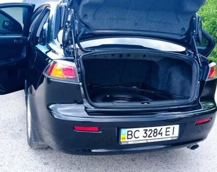 Чорний Міцубісі Lancer, об'ємом двигуна 2 л та пробігом 49 тис. км за 12500 $, фото 6 на Automoto.ua