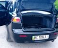 Чорний Міцубісі Lancer, об'ємом двигуна 2 л та пробігом 49 тис. км за 12500 $, фото 6 на Automoto.ua