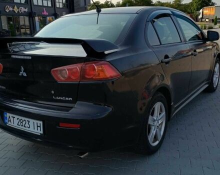 Чорний Міцубісі Lancer, об'ємом двигуна 2 л та пробігом 145 тис. км за 5200 $, фото 3 на Automoto.ua