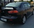 Чорний Міцубісі Lancer, об'ємом двигуна 2 л та пробігом 145 тис. км за 5200 $, фото 3 на Automoto.ua