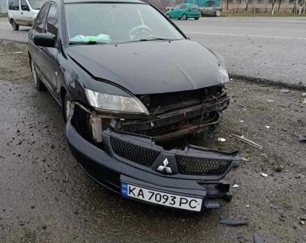 Чорний Міцубісі Lancer, об'ємом двигуна 1.6 л та пробігом 340 тис. км за 1776 $, фото 1 на Automoto.ua