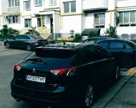 Черный Мицубиси Лансер, объемом двигателя 2 л и пробегом 190 тыс. км за 7100 $, фото 4 на Automoto.ua