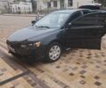 Черный Мицубиси Лансер, объемом двигателя 2 л и пробегом 130 тыс. км за 7700 $, фото 1 на Automoto.ua