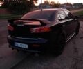 Черный Мицубиси Лансер, объемом двигателя 2 л и пробегом 200 тыс. км за 5519 $, фото 6 на Automoto.ua
