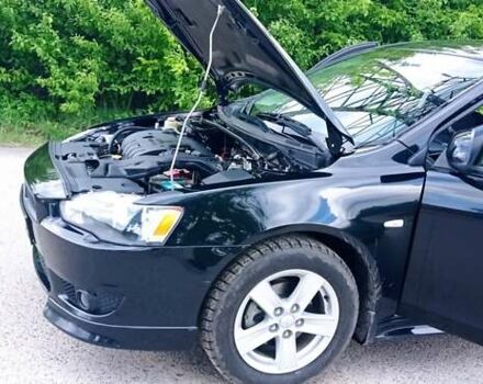 Чорний Міцубісі Lancer, об'ємом двигуна 2 л та пробігом 49 тис. км за 12500 $, фото 8 на Automoto.ua