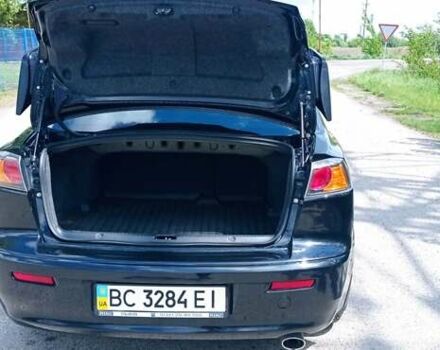 Чорний Міцубісі Lancer, об'ємом двигуна 2 л та пробігом 49 тис. км за 12500 $, фото 42 на Automoto.ua