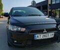 Чорний Міцубісі Lancer, об'ємом двигуна 2 л та пробігом 145 тис. км за 5200 $, фото 1 на Automoto.ua