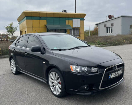 Черный Мицубиси Лансер, объемом двигателя 1.97 л и пробегом 300 тыс. км за 6800 $, фото 2 на Automoto.ua